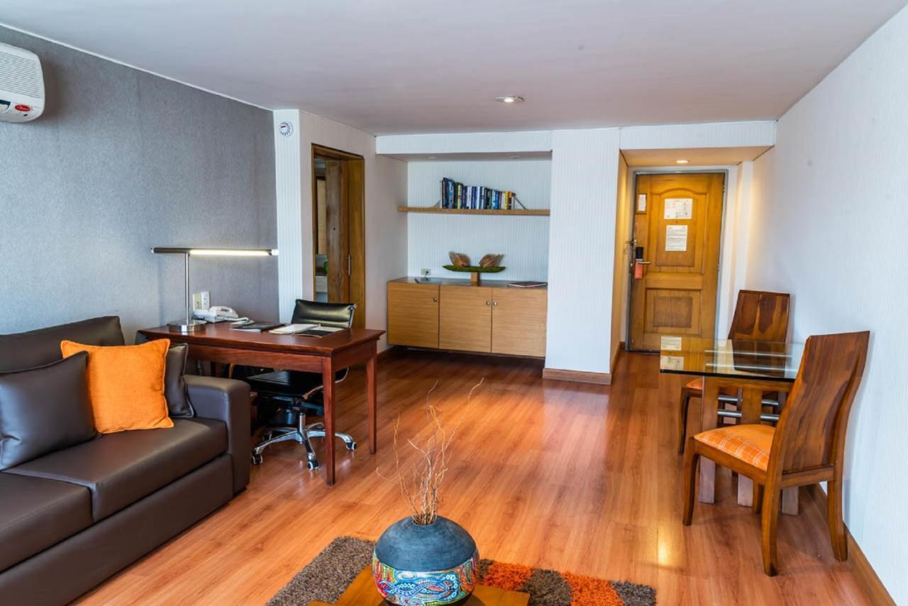 Bogota Plaza Hotel Εξωτερικό φωτογραφία A living room in a suite at the hotel